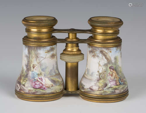 A pair of late 19th century French enamelled and gilt metal opera glasses