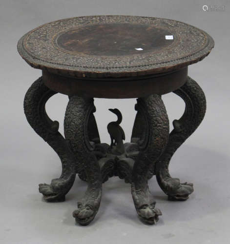 A late 19th century Burmese carved hardwood occasional table