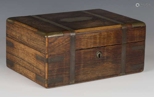 A Regency rosewood and brass bound gentleman's vanity case