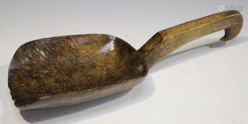 A 19th century carved sycamore grain or flour scoop with a shaped handle