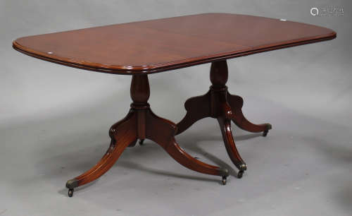 A modern George III style mahogany dining room suite