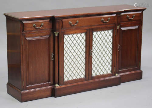 A modern Regency style mahogany breakfront side cabinet