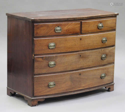 An early 19th century mahogany bowfront chest of two short and three long drawers