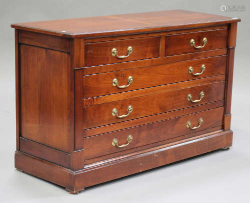 A modern cherrywood chest of two short and three long drawers