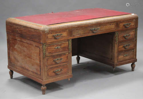 An early 20th century French walnut and gilt metal mounted twin pedestal desk