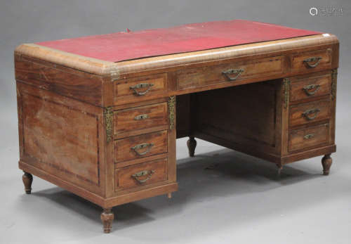 An early 20th century French walnut and gilt metal mounted twin pedestal desk