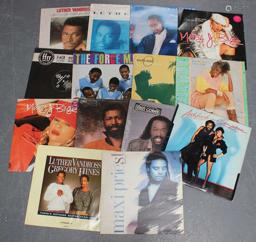 A collection of LP records and 12