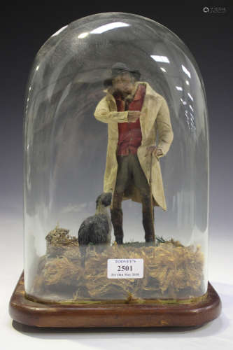 A 19th century Continental wax figure of a shepherd and his dog