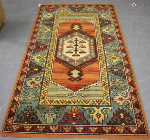 A machine made Turkish design rug