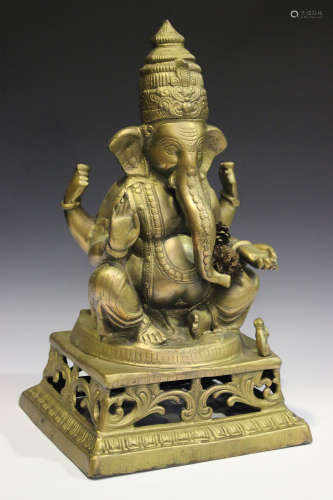 A 20th century gilt painted metal figure of Ganesha
