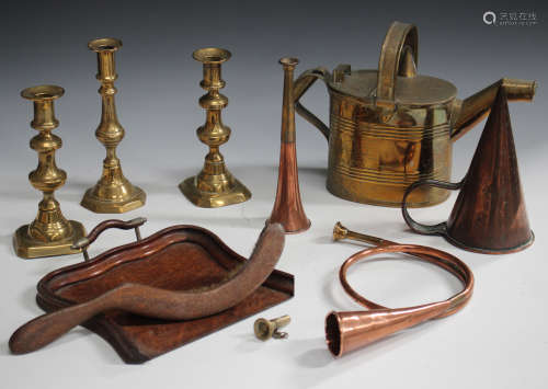 A collection of various copper and brassware