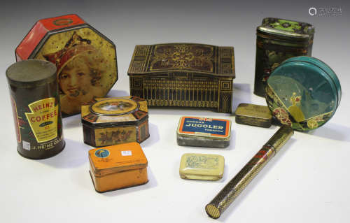 A large collection of mixed advertising tins