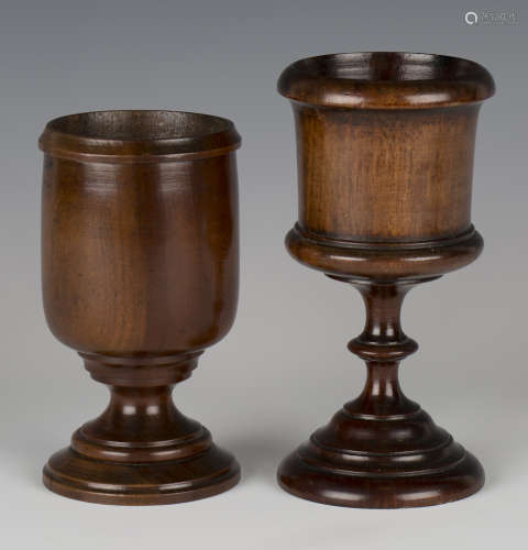An early 19th century turned treen goblet with an overall rich brown patina