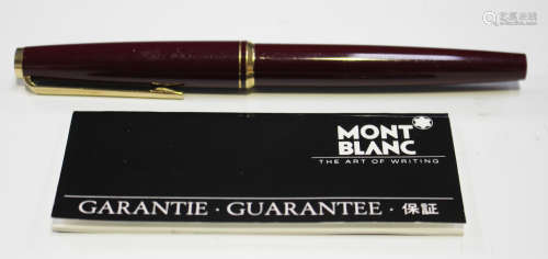 A Montblanc burgundy fountain pen