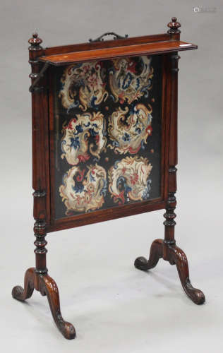 A Regency rosewood firescreen with tapestry inset panel