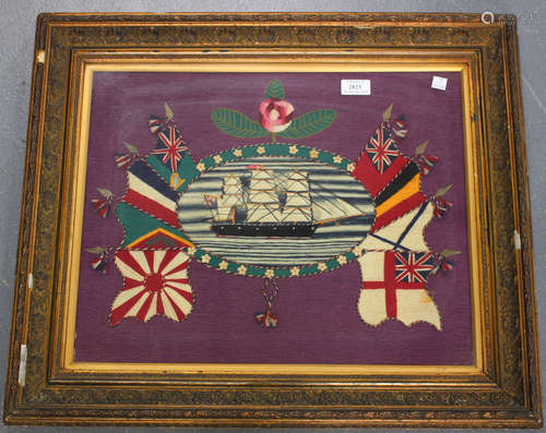 A late 19th/early 20th century sailor's woolwork panel depicting a three masted ship flanked by eight flags