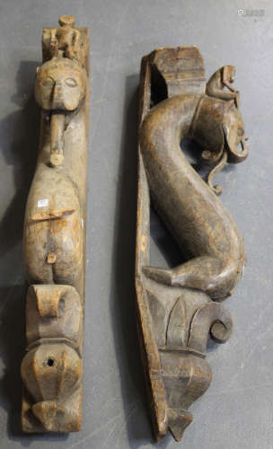 A pair of 19th century Indian carved wooden architectural mounts