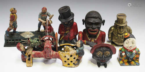 A group of seven 20th century Victorian style cast iron novelty money boxes of various designs.Buyer’s Premium 29.4% (including VAT @ 20%) of the hammer price. Lots purchased online via the-saleroom.com will attract an additional charge of 6% (including VAT @ 20%) of the hammer price.                                                                                                                                                        Sale of Antiques