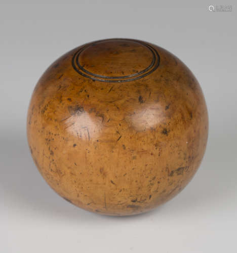 A 19th century turned fruitwood carpet bowl