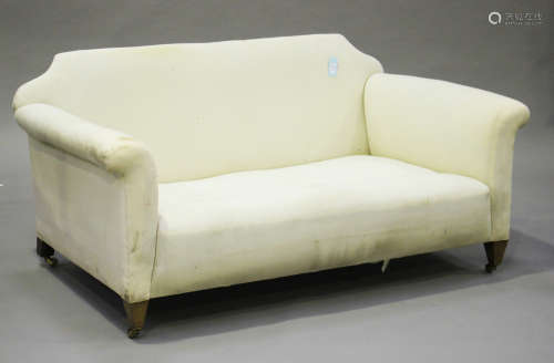 An early 20th century Howard & Sons style scroll arm two-seat sofa