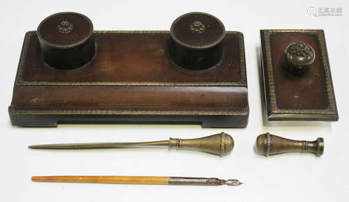 A late 19th century French bronze desk set