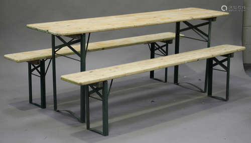 A late 20th century pine and metal folding trestle table