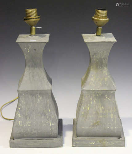A pair of 20th century grey tole painted metal table lamps of ogee square section