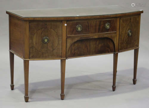 An early 20th century George III style mahogany bowfront sideboard