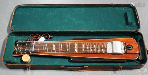 A mid-20th century electric lap steel eight string guitar with mother-of-pearl inlaid fingerboard