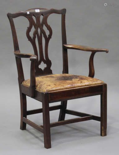 A George III mahogany pierced splat back elbow chair