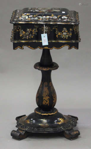 A mid-Victorian black papier-mâché work table with overall mother-of-pearl and gilt decoration