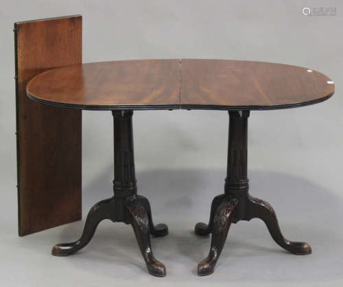 A late 19th/early 20th century mahogany 'D'-end dining table with single extra leaf