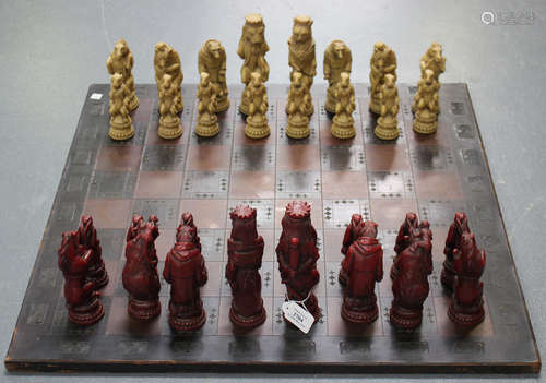 A late 20th century moulded resin chess set