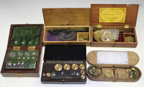 A late 18th century wooden cased balance scale and weights