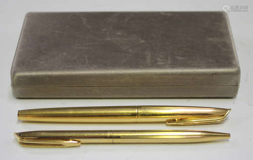 A Waterman C/F model gold plated fountain pen and matching ballpoint pen