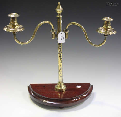 A 19th century gilt brass twin branch adjustable candelabrum