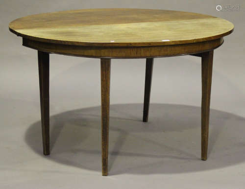 A George III mahogany circular drop-flap breakfast table