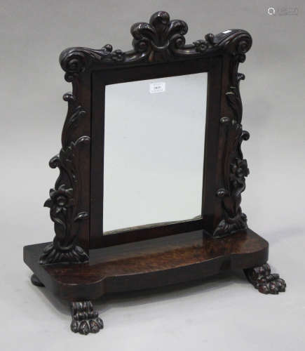 A William IV figured mahogany swing frame mirror