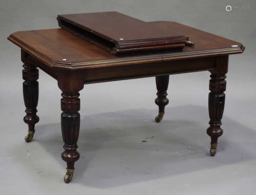 A late Victorian walnut extending dining table