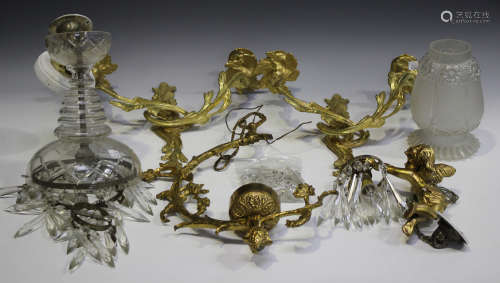 A pair of 20th century Rococo style gilt metal two branch wall lights
