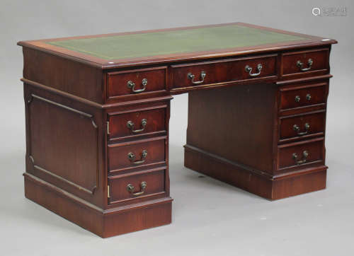 A 20th century mahogany twin pedestal desk