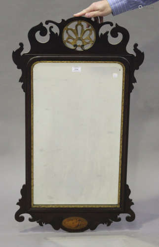 A late 19th century mahogany fretwork framed wall mirror with shell inlaid decoration