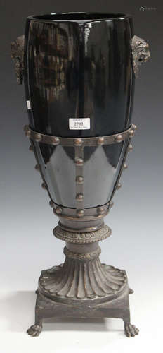 A late 20th century Continental style black glazed pottery and patinated cast bronze ornamental urn