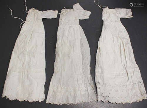 An Edwardian white linen christening gown with broderie anglaise decoration