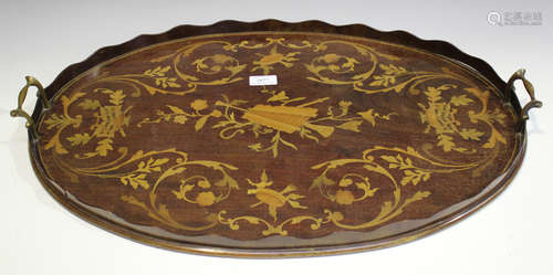 An Edwardian mahogany oval tea tray