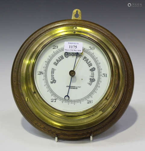 A 20th century brass cased circular wall barometer