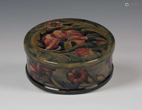 A Moorcroft pottery circular pot and cover