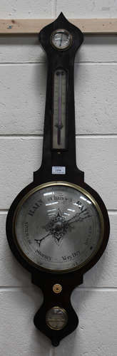 An early Victorian rosewood wheel barometer with silvered dials