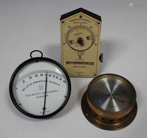 An early 20th century Negretti & Zambra desk weather forecaster