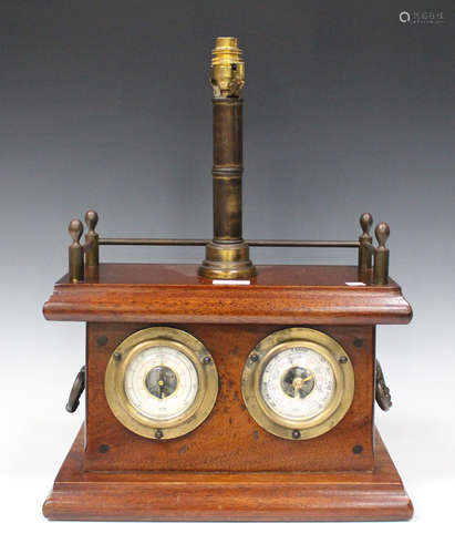 An early 20th century mahogany cased weather station/table lamp